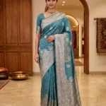Teal Blue Bamboo Silk Saree for Women with woven paisley motifs and intricate border